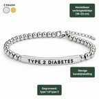 Diabetes armband in zilver: balletjesketting met gebogen plaatje (type 1 of type 2), karabijnsluiting en verlengkettinkje (18–23 cm)